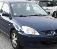 Mitsubishi Lancer 2006 IX Седан 4-дв. 1.6 MT (98 л.с.) в разборе